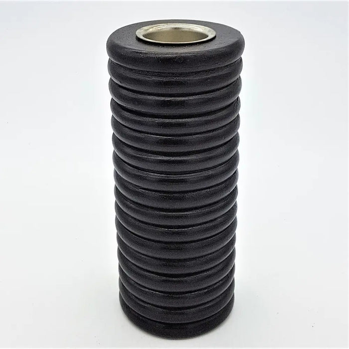 Tall ribbed wooden tealight holder in black with a cylindrical shape and metallic rim for candle use