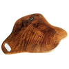 Teak chopping board 30cm with natural irregular shape and rich brown tones featuring dark grain patterns