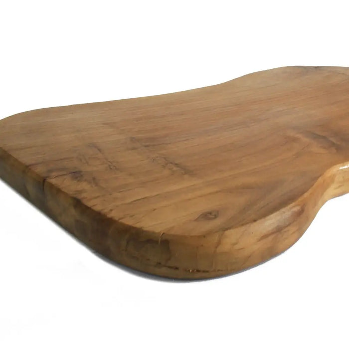 Teak chopping board with smooth light brown finish and visible grain patterns made from natural wood