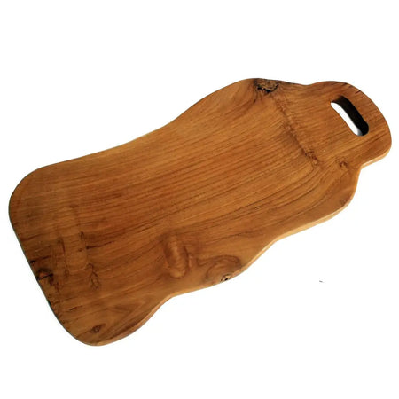 A smooth light brown teak chopping board with natural grain pattern and an integrated handle, 50cm long
