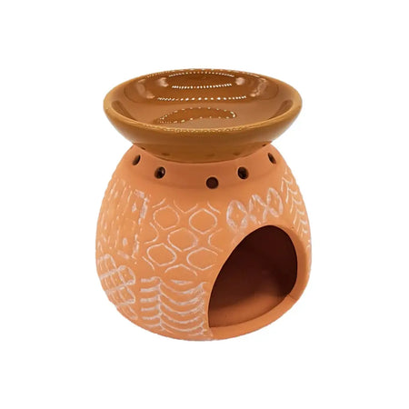 Terracotta kasbah oil burner wax melt warmer with white geometric and leaf patterns in ceramic material