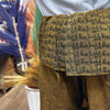 Golden fabric belt with black tibetan script woven on cotton thai fisherman pants mandala mantra orange
