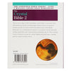The back cover of the crystal bible 2 by judy hall shows a maroon teal header with white text and an amber crystal sphere