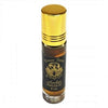 The Window, Milford Haven Dream Spirit Amber roll-on perfume oil in an 8ml glass bottle with a gold cap.