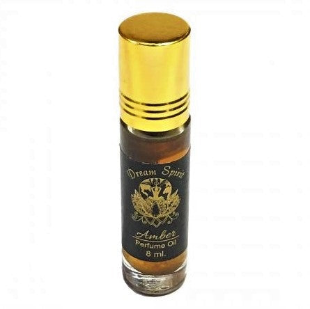 The Window, Milford Haven Dream Spirit Amber roll-on perfume oil in an 8ml glass bottle with a gold cap.