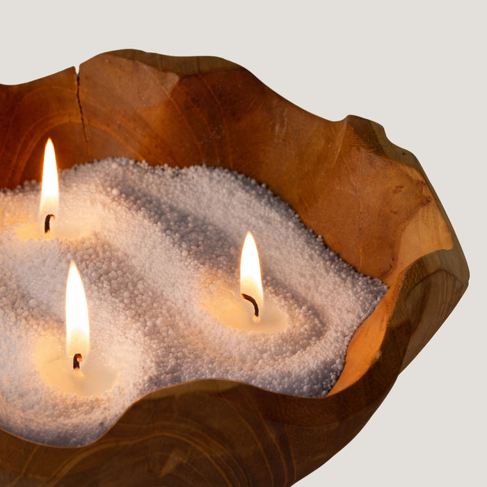 The Window, Milford Haven Azure Noir warm grey candle sand burning with three wicks in a rustic wooden bowl