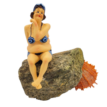 The Window, Milford Haven resin Bathing Beauties shelf-sitter figurine wearing a blue bikini, sitting on a rock.