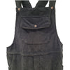 The Window, Milford Haven black jumbo cord dungarees featuring a buttoned front pocket and adjustable shoulder straps.