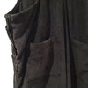 The Window, Milford Haven black jumbo cord dungarees featuring a front patch pocket and side button detailing.