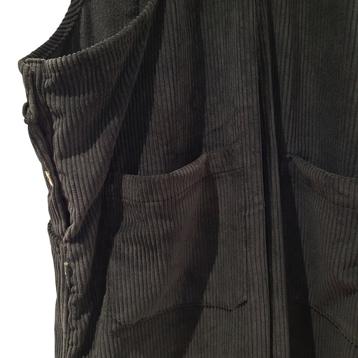 The Window, Milford Haven black jumbo cord dungarees featuring a front patch pocket and side button detailing.