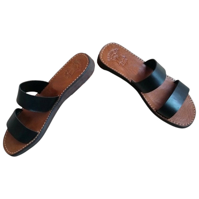 The Window, Milford Haven handmade black leather double strap sandals with a comfortable flat organic sole.