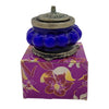 The Window, Milford Haven Nag Champa scented soy candle in a blue pumpkin-shaped glass jar with ornate metal lid