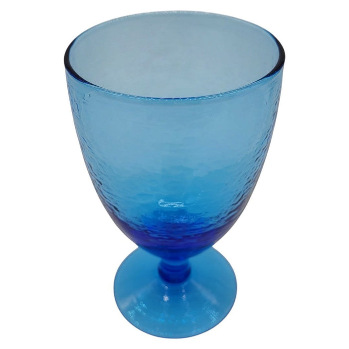 The Window, Milford Haven ice blue recycled glass wine glass with a hammered texture and elegant stemmed design.