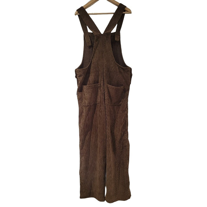The Window, Milford Haven chocolate brown jumbo cord dungarees with rear patch pockets, back view on a hanger.