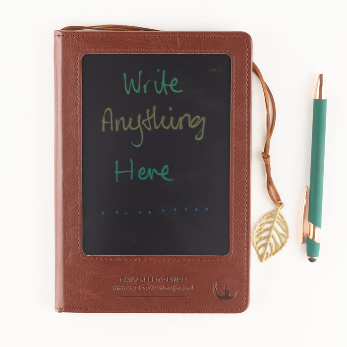 The Window, Milford Haven brown leather-effect A5 notebook featuring a reusable LCD wipe screen and leaf bookmark.