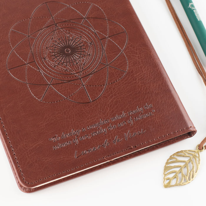 The Window, Milford Haven brown leather-effect notebook with a mandala design and Leonardo da Vinci quote.