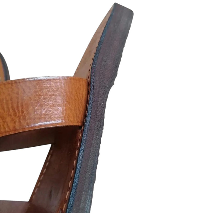 Close-up side view of The Window, Milford Haven handmade brown leather sandals with durable organic material soles.