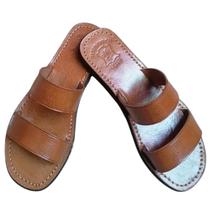 The Window, Milford Haven handmade brown leather double strap sandals with a minimalist flat sole design.
