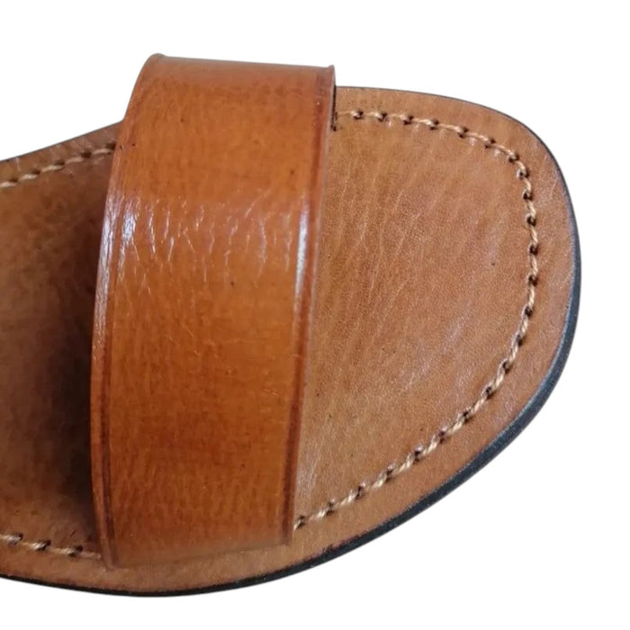 The Window, Milford Haven handmade brown leather sandals featuring a minimalist double strap and durable stitching.