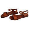 The Window, Milford Haven handmade brown leather sandals with a minimalist single strap and adjustable ankle buckle.