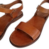 The Window, Milford Haven handmade brown genuine leather flat sandals with a minimalist single and ankle strap design.