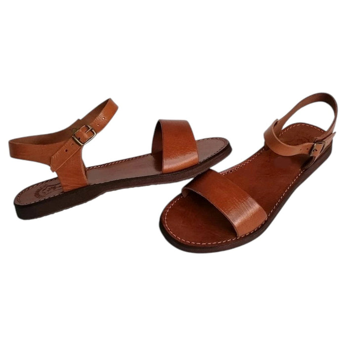 The Window, Milford Haven handmade brown leather sandals with an ankle strap and flat organic sole for summer wear.