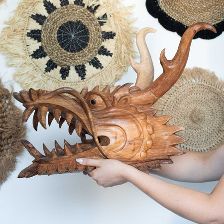 The Window, Milford Haven hand-carved Suar wood dragon head sculpture with intricate details and natural wood grain.