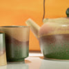 The Window, Milford Haven ceramic Japanese kyusu style tea set with green and beige gradient glaze and side handle