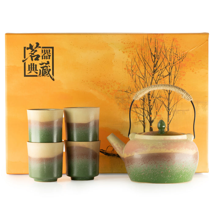 The Window, Milford Haven ceramic Japanese kyusu style tea set with a teapot and four cups in a green and beige gradient
