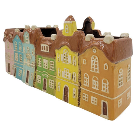 The Window, Milford Haven ceramic planter shaped like a row of colourful pastel townhouses for plants or storage.