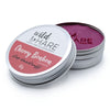 The Window, Milford Haven Wild Hare Cherry Bonbon solid shampoo bar in a 60g travel tin with a pink bar inside.