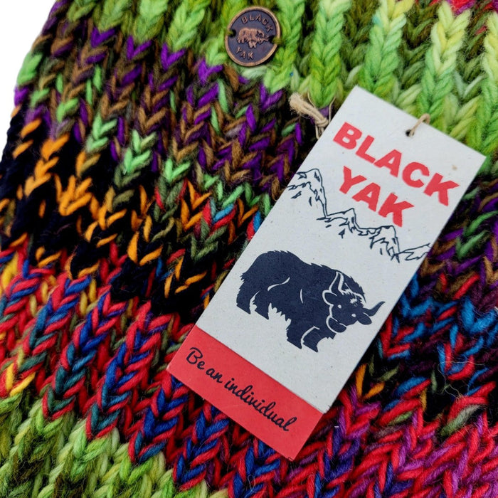 The Window, Milford Haven chunky hand-knit wool scarf in electric green, purple, and blue stripes with Black Yak tag