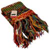 The Window, Milford Haven chunky hand-knit 100% wool scarf in a vibrant multi-colored electric stripe with fringe.