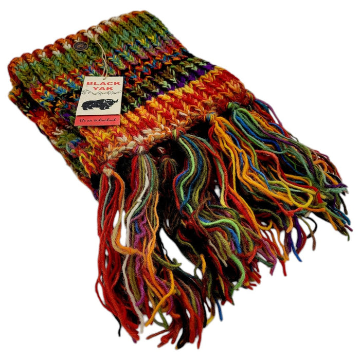 The Window, Milford Haven chunky hand-knit 100% wool scarf in a vibrant multi-colored electric stripe with fringe.