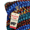 The Window, Milford Haven chunky hand-knit wool scarf in electric blue multi-colored stripes with Black Yak tag