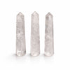 Three The Window, Milford Haven clear quartz six-face obelisk points with polished finish on a white background.