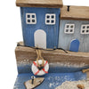 The Window, Milford Haven rustic wooden coastal ornament featuring blue cottages, a lifebuoy, and miniature boat.