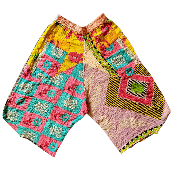 The Window, Milford Haven cropped Kantha trousers in cotton with patchwork floral patterns and a pink waistband.