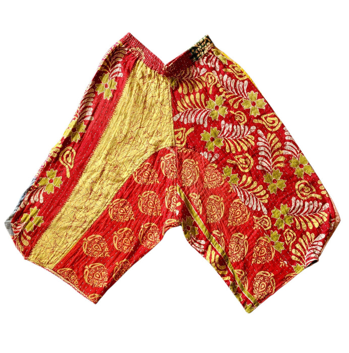The Window, Milford Haven cropped Kantha cotton trousers featuring a red waistband and vibrant floral patchwork design.