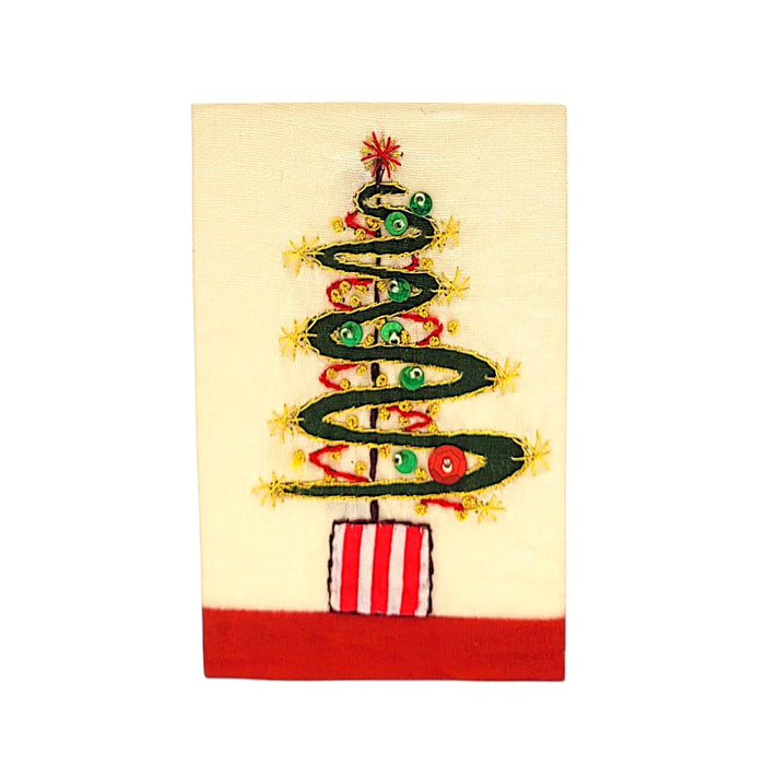 The Window, Milford Haven hand-embroidered Christmas card featuring a green tree design on recycled paper with sequins.