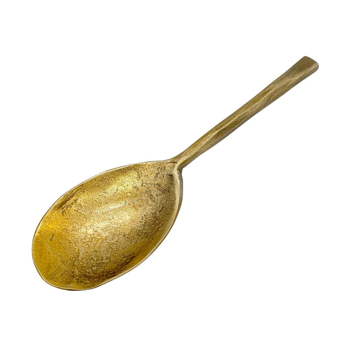 The Window, Milford Haven gold-toned forged metal oval spoon with an antique finish and rustic handmade texture.