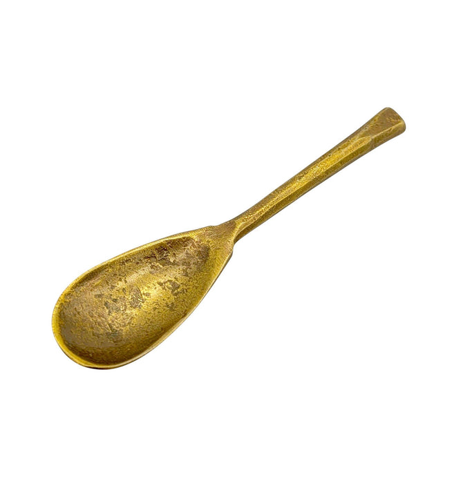 The Window, Milford Haven gold-toned forged metal oval spoon with a rustic antique finish and textured handle.