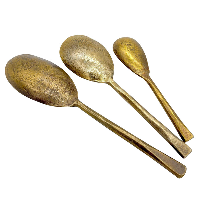 The Window, Milford Haven set of three gold-toned forged metal oval spoons with a rustic antique finish.