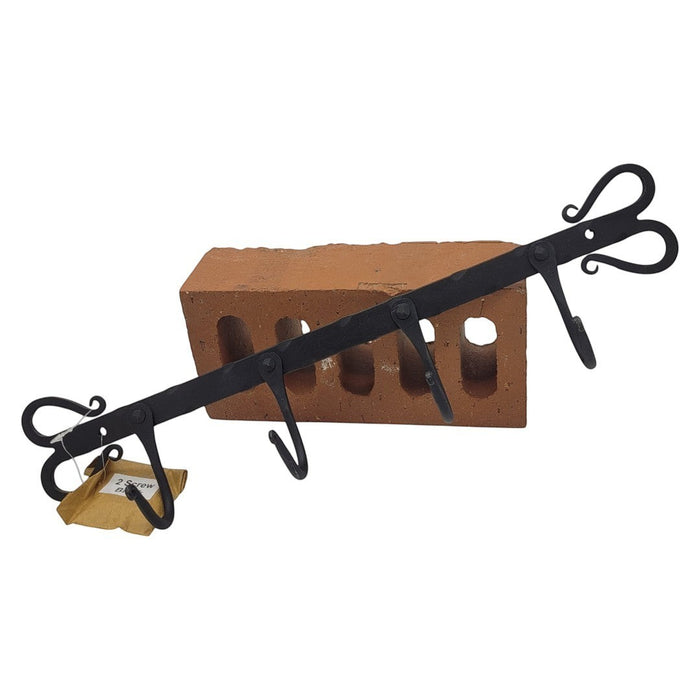 The Window, Milford Haven black forged metal wall hanger featuring four hooks and decorative heart-shaped ends.