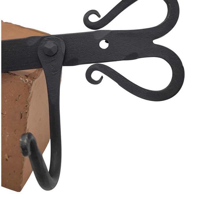 The Window, Milford Haven black forged metal heart-shaped wall hook with a rustic iron finish.