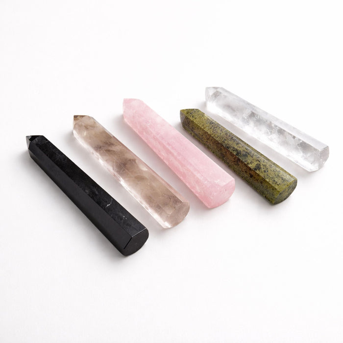 The Window, Milford Haven collection of five polished six-face gemstone obelisk points in various natural stone colors.