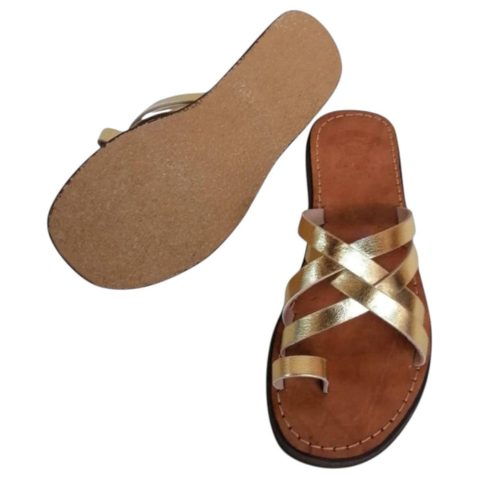 The Window, Milford Haven handmade gold leather sandals with crossed straps and a comfortable flat organic sole.