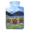 The Window, Milford Haven handmade wool felt hot water bottle featuring a scenic Highland Cow design on a blue field.