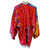The Window, Milford Haven red and navy Kantha-stitched cotton kimono with wide sleeves and fringed hem, back view.