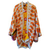 The Window, Milford Haven orange and beige Kantha-stitched cotton kimono with wide sleeves and fringed border.